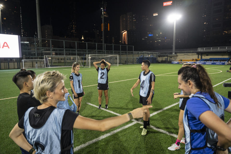 Women's seven-a-side team train in Happy Valley ahead of the Gay Games in Hong Kong, Tuesday, Oct. 31, 2023. Set to launch on Friday, Nov. 3, 2023, the first Gay Games in Asia are fostering hopes for wider LGBTQ+ inclusion in the Asian financial hub. (AP Photo/Chan Long Hei)