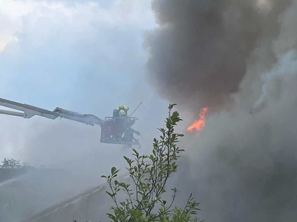 Firefighters working to put out the fire