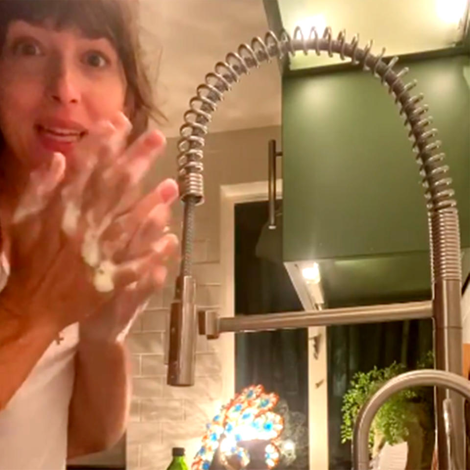 Dakota Johnson (and Chris Martin's hands) keep it clean. (oliviawilde/Instagram)