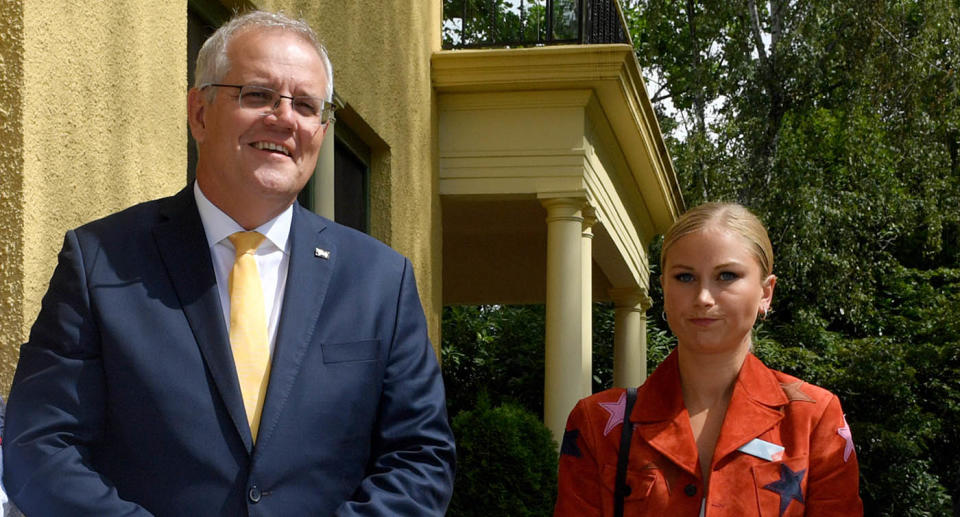 Prime Minister Scott Morrison and 2021 Australian of the Year Grace Tame during a morning tea for state and territory recipients in the 2022 Australian of the Year Awards at The Lodge in Canberra.