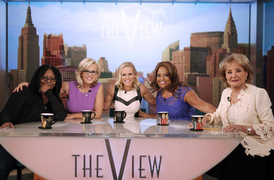 This April 15, 2014, photo provided by ABC shows, from left, co-hosts Whoopi Goldberg, Jenny McCarthy, political commentator, guest Margaret Hoover, Sherri Shepherd, and Barbara Walters, on ABC's show "The View." The show will gather all 11 past and present co-hosts to salute Walters as she retires from daily television in a first-ever reunion that will air on the May 15, episode, the day before Walters says goodbye as series co-host. (AP Photo/ABC, Heidi Gutman)