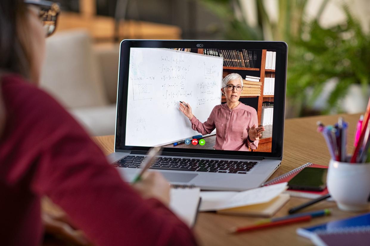 student watching lesson online and studying from home