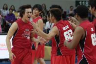 Enrique Gil plays for team Jao during Princess and I 'The Royal Championship' basketball game held at the Mall of Asia Arena in Pasay city, south of Manila on 20 January 2012.