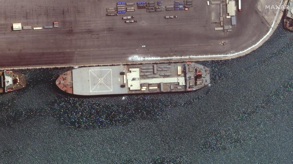 In this satellite photo provided by Maxar Technologies, the Iranian navy vessel Makran is seen at port at Bandar Abbas, Iran, April 28, 2021. An Iranian destroyer and support vessel are now sailing in the Atlantic Ocean in a rare mission far from the Islamic Republic, Iran's state TV reported on Thursday, June 10, 2021, without offering the vessels' final destination. (©2021 Maxar Technologies via AP)