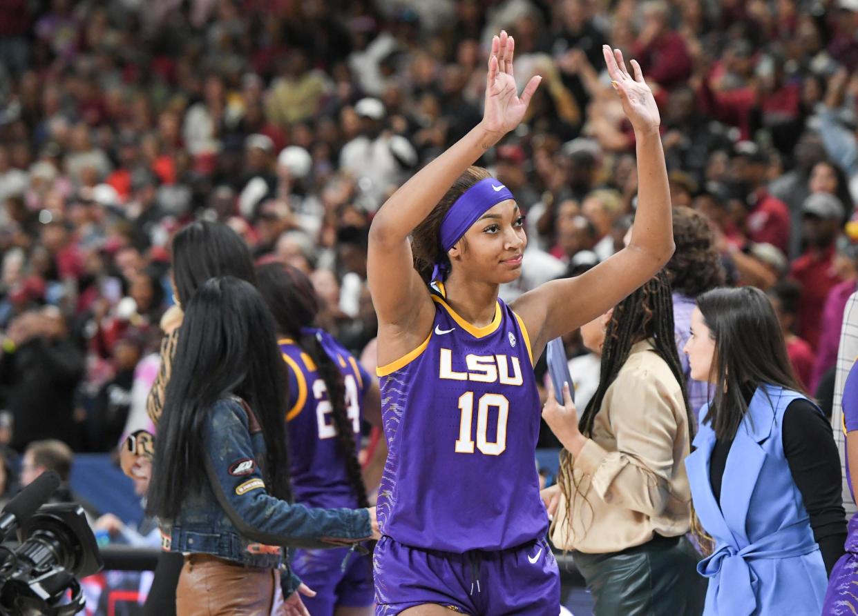 Louisiana State University forward Angel Reese (10) waves to fans after South Carolina beat LSU for the SEC Women's Basketball Tournament Championship at the Bon Secours Wellness Arena in Greenville, S.C. Sunday, March 10, 2024. (Ken Ruinard / staff-USA TODAY NETWORK)