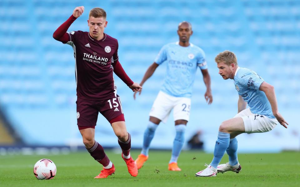 Kevin de Bruyne of Manchester City in action against Harvey Barnes of Leicester during the English Premier League - Shutterstock