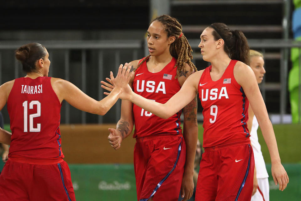 Breanna Stewart (right) and Brittney Griner (center) high-five Diana Taurasi after scoring during Team USA's win over Spain. (Christian Petersen/Getty Images)