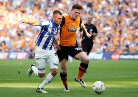 Britain Soccer Football - Hull City v Sheffield Wednesday - Sky Bet Football League Championship Play-Off Final - Wembley Stadium - 28/5/16 Sheffield Wednesday's Jack Hunt in action with Hull City's Andrew Robertson Action Images via Reuters / Andrew Couldridge Livepic EDITORIAL USE ONLY. No use with unauthorized audio, video, data, fixture lists, club/league logos or "live" services. Online in-match use limited to 45 images, no video emulation. No use in betting, games or single club/league/player publications. Please contact your account representative for further details.