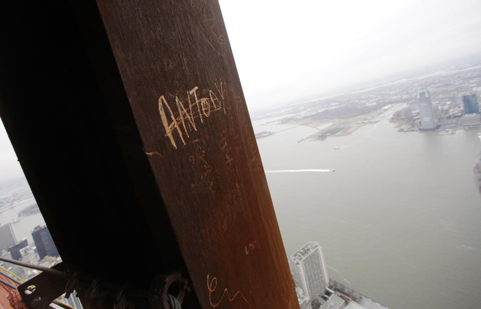 In this Jan. 15, 2013 photo, “Antony," left his graffiti on a steel column on the 102nd floor of One World Trade Center in New York. Workers finishing New York's tallest building at the World Trade Center are leaving their personal marks on the concrete and steel in the form of graffiti. (AP Photo/Mark Lennihan)