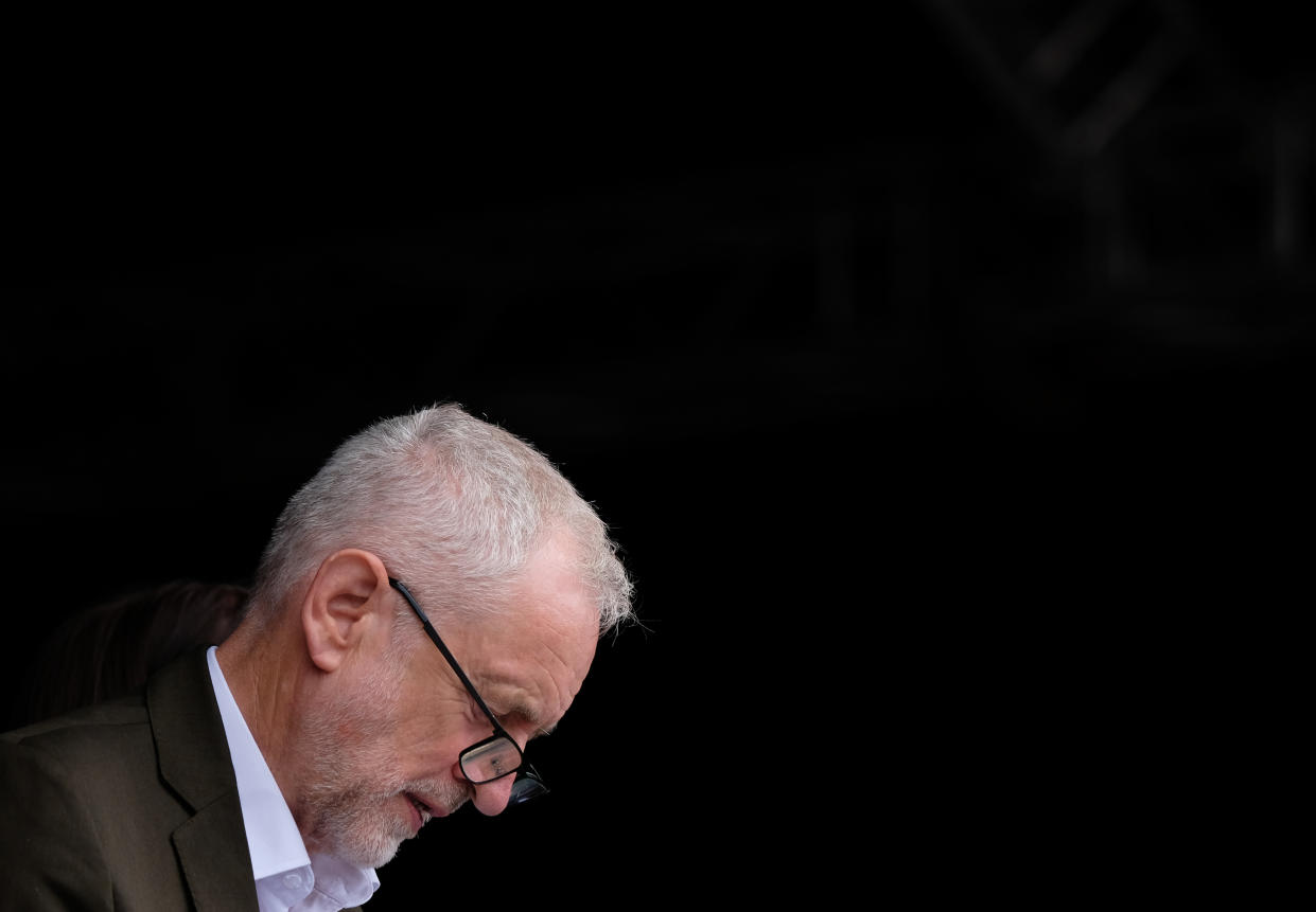 DURHAM, ENGLAND - JULY 13: Labour leader Jeremy Corbyn checks his notes before he addresses the crowd during the 135th Durham Miners Gala on July 13, 2019 in Durham, England. Over two decades after the last pit closed in the Durham coalfield the Miners Gala or Big Meeting as it is known locally remains as popular as ever with close to 200,000 people expected to attend this year. The gala forms part of the culture and heritage of the area and represents the communal values of the North East of England. The gala sees traditional colliery brass bands march through the city ahead of their respective pit banners before pausing to play outside the County Hotel building where union leaders, invited guests and dignitaries gather before they then continue to the racecourse area for a day of entertainment and speeches. Beginning in 1871 the gala is the biggest trade union event in Europe and is part of an annual celebration of socialism. This year also marks the 150th anniversary of the Durham Miners’ Association. The gala is hosted by the DMA who also provide a range of services for its members, made up from former Durham miners, including compensation claims, benefit information, tribunal representation and legal advice. (Photo by Ian Forsyth/Getty Images)