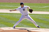 New York Yankees starting pitcher Jameson Taillon (50) throws in the first inning of a baseball game against the Detroit Tigers, Saturday, May 1, 2021, in New York. (AP Photo/John Minchillo)