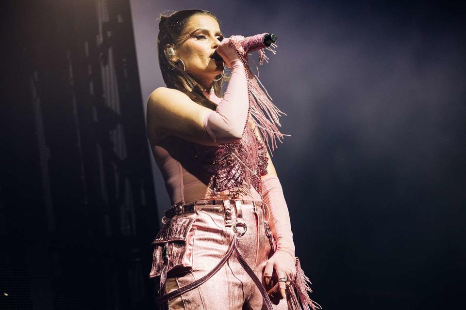 <p>Matt Winkelmeyer/Getty Images</p> Nelly Furtado performing with Dom Dolla at Coachella Weekend 1 in Indio, California on April 13, 2024