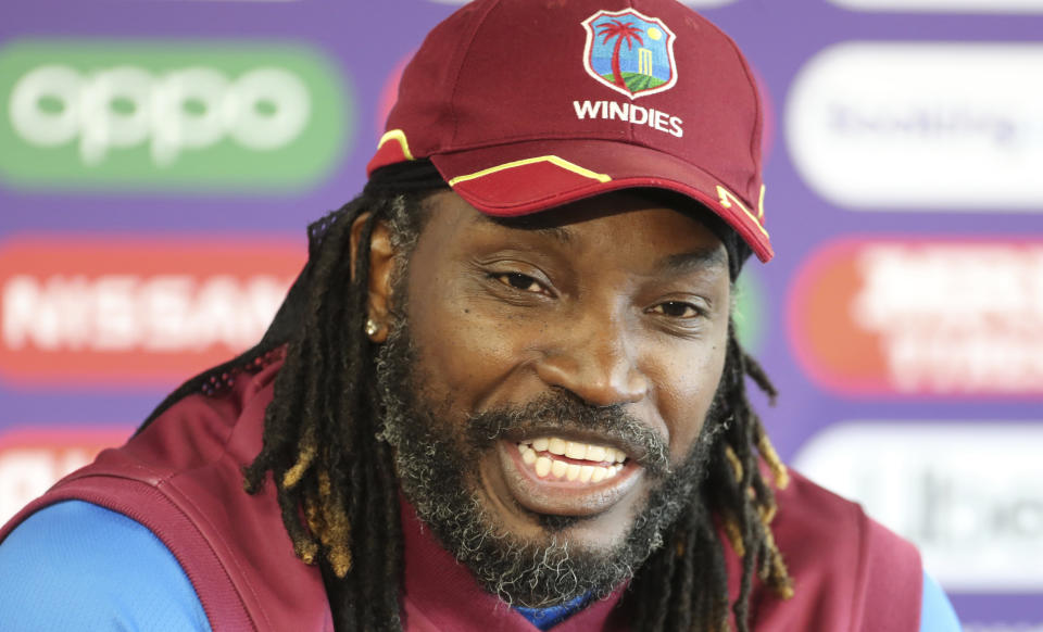 West Indies' Chris Gayle speaks during a press conference after attending a training session ahead of their Cricket World Cup match against India at Old Trafford in Manchester, England, Wednesday, June 26, 2019. (AP Photo/Aijaz Rahi)