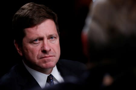 FILE PHOTO: Jay Clayton, Chairman of the Securities and Exchange Commission, listens during an interview with CNBC at the Sandler O'Neill + Partners Global Exchange and Brokerage Conference in New York