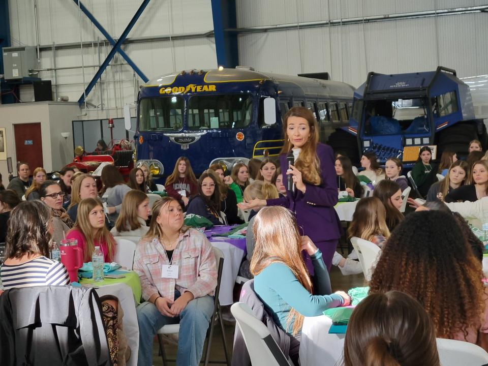Julie Carrier speaks to Ottawa County freshmen girls March 21 at Ohio’s inaugural Young Women Lead Conference at the Liberty Aviation Museum.