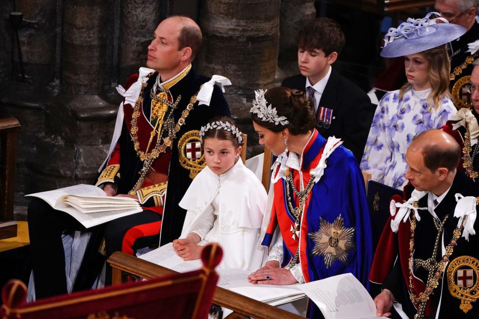 london, england may 06 left to right 1st row the prince of wales, princess charlotte, the princess of wales, and the duke of edinburgh during the coronation of king charles iii and queen camilla on may 6, 2023 in london, england the coronation of charles iii and his wife, camilla, as king and queen of the united kingdom of great britain and northern ireland, and the other commonwealth realms takes place at westminster abbey today charles acceded to the throne on 8 september 2022, upon the death of his mother, elizabeth ii photo by yui mok wpa poolgetty images