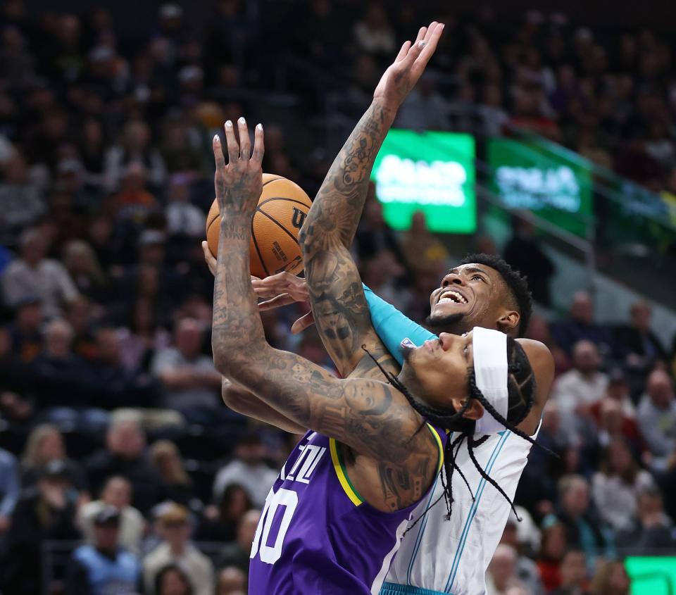 Utah Jazz guard Jordan Clarkson (00) defends Charlotte Hornets forward Brandon Miller (24) in Salt Lake City on Thursday, Feb. 22, 2024. | Jeffrey D. Allred, Deseret News