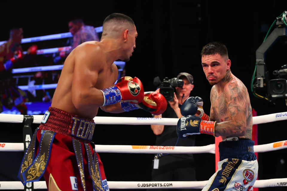 George Kambosos Jr (pictured right) fights Teofimo Lopez (pictured left) for the Undisputed Lightweight title.