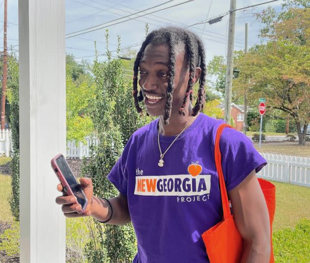 PHOTO: Shamarius Bolton knocks on doors for the New Georgia Project to try to engage 2022 voters, in Georgia. (Courtesy New Georgia Project)