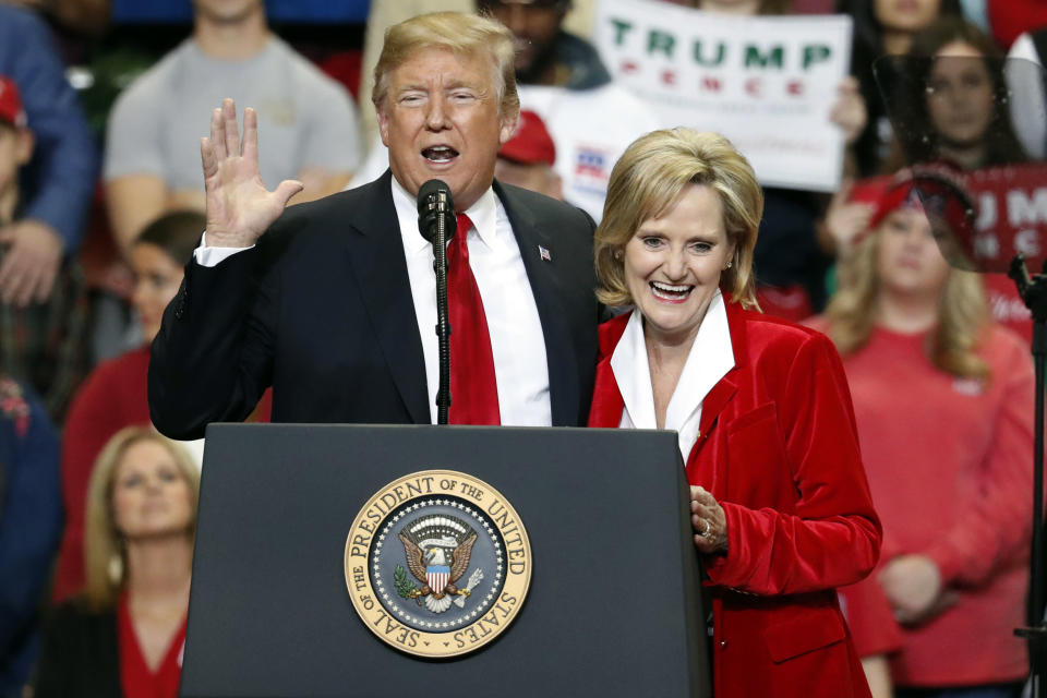 President Trump encourages voters to support Sen. Cindy Hyde-Smith in her runoff against Democrat Mike Espy at a rally Monday in Biloxi, Miss. (Photo: Rogelio V. Solis/AP)