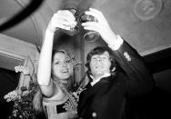 <p>Film director Roman Polanski and his wife, Sharon Tate, lift their glasses in a toast at the premiere of his film “Rosemary’s Baby” in London on Jan. 23, 1969. (Photo: AP) </p>