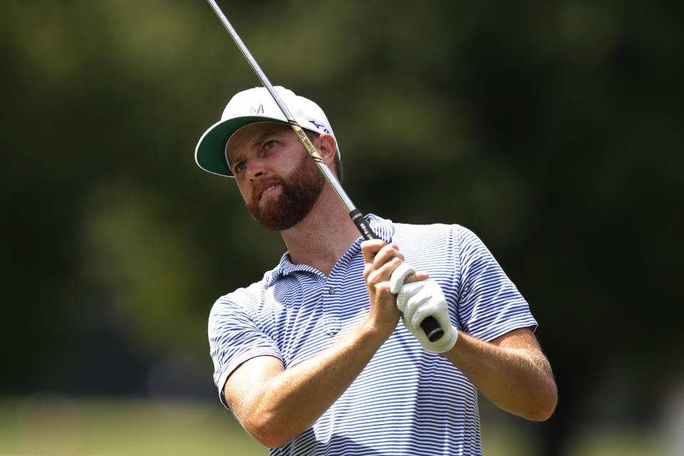 Chris Kirk drives on the 15th tee during the second round of the Rocket Mortgage Classic golf tournament, Friday, July 3, 2020, at the Detroit Golf Club in Detroit. (AP Photo/Carlos Osorio)