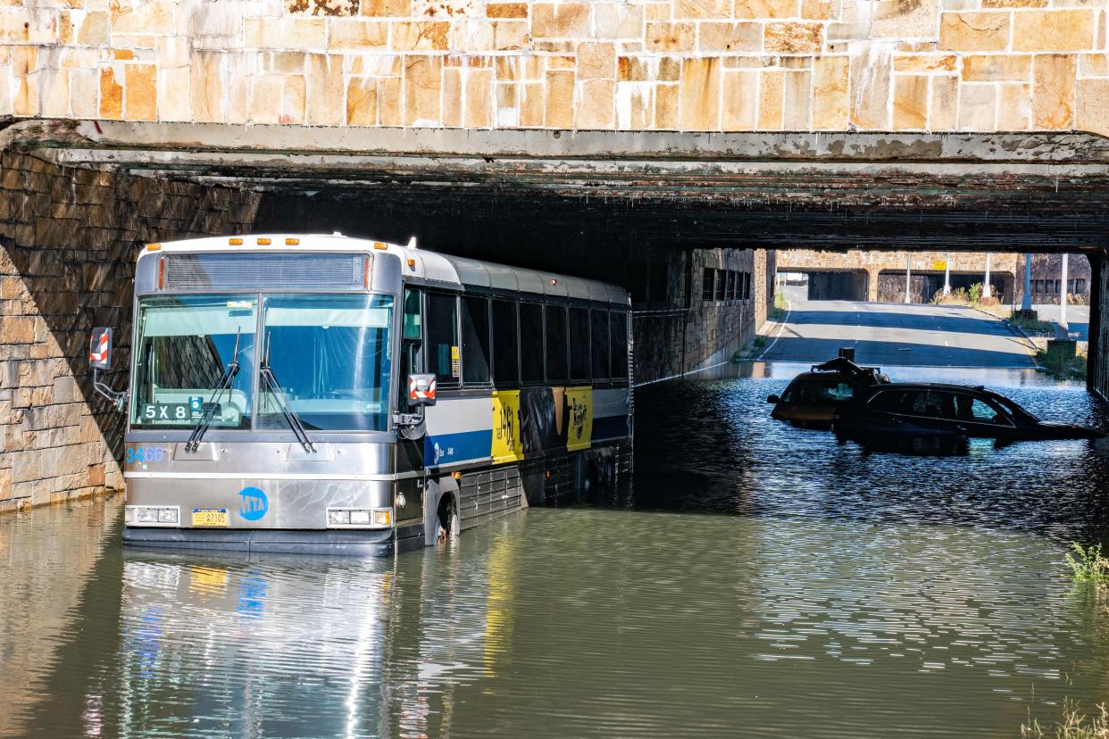 MTA bus and cars caught in flood water on Queens Boulevard in Queens on Thursday Sept. 2, 2021.