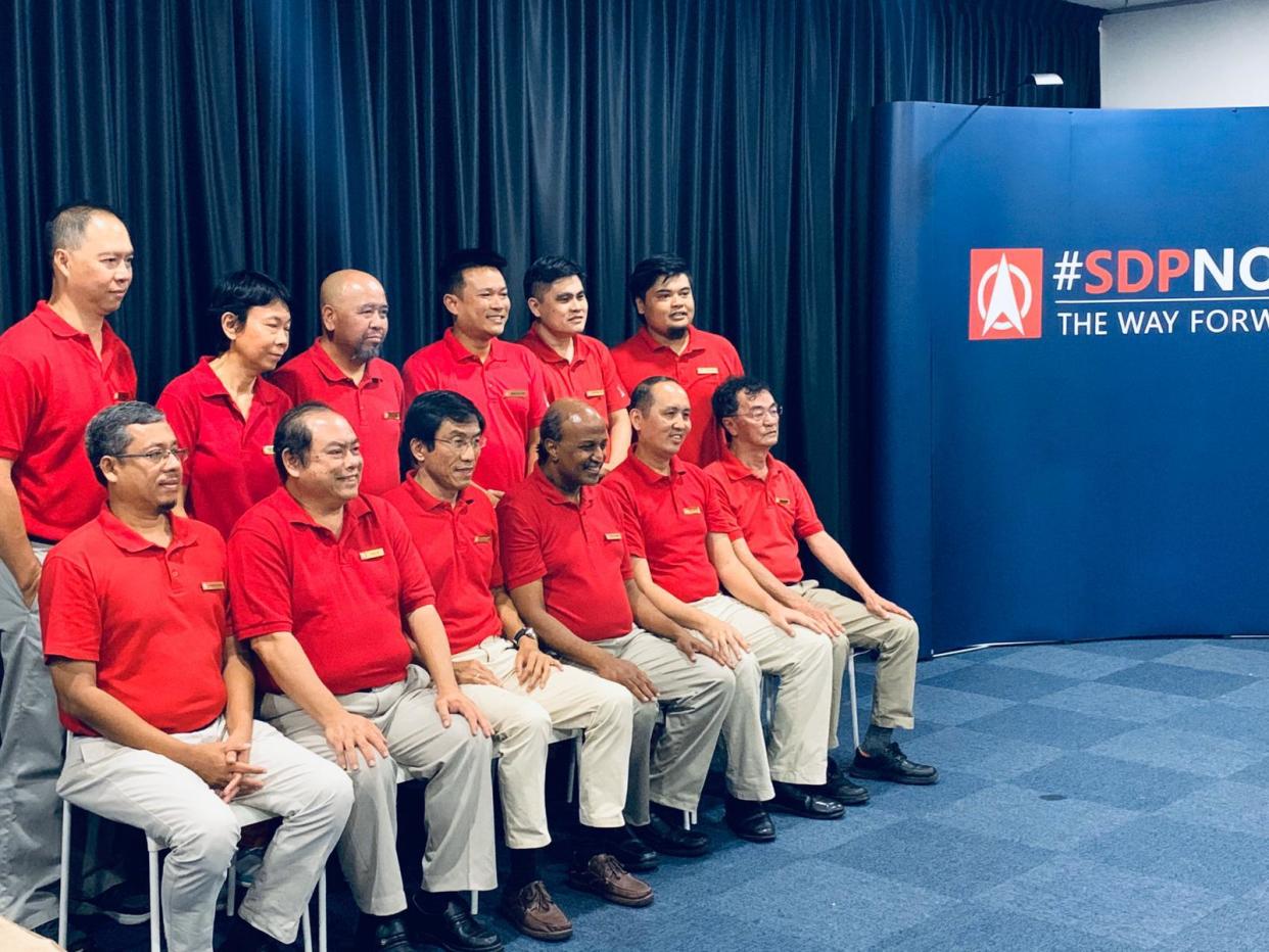 The newly-elected Singapore Democratic Party central executive committee, with secretary-general Chee Soon Juan (seated, third from left) and chairman Paul Tambyah (seated, fourth from left).