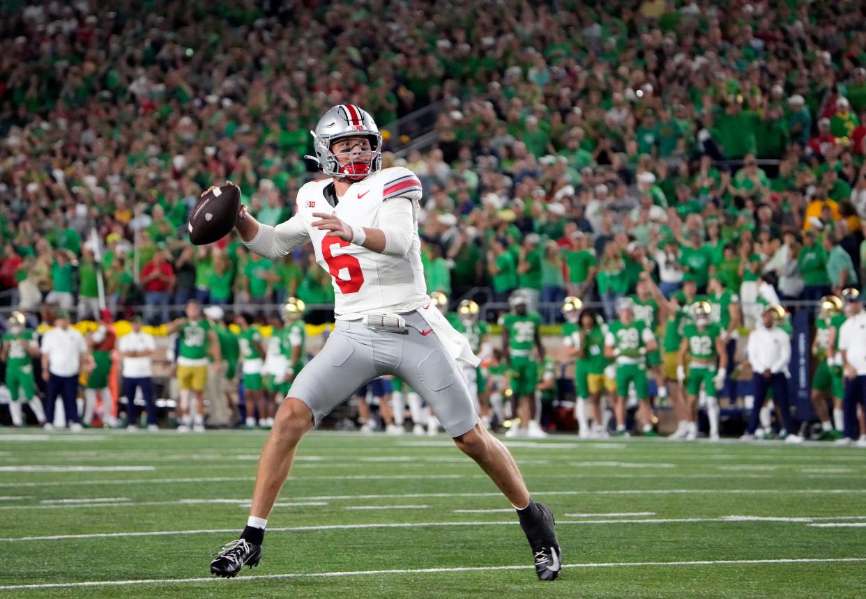 Ohio State quarterback Kyle McCord throws the ball in the second quarter of the Buckeyes' 17-14 win over Notre Dame.