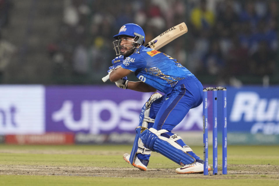 Delhi Capitals' Tilak Varma plays a shot during the Indian Premier League (IPL) match between Delhi Capitals and Mumbai Indians in New Delhi, India, Tuesday, April 11, 2023. (AP Photo/Manish Swarup)