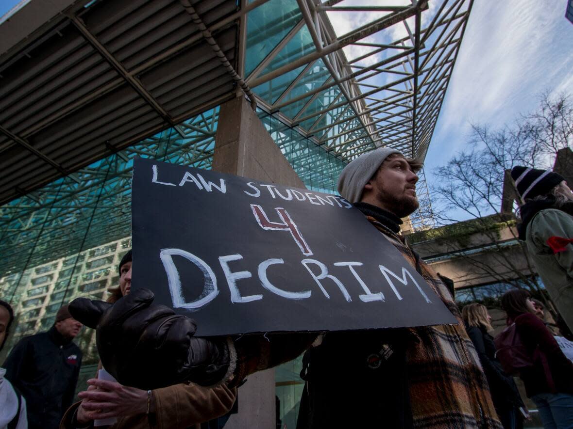 Advocates for drug decriminalization at a 2018 rally in Vacnouver. This week, B.C. began a three-year pilot that will allow possession of small amounts of drugs. (Tina Lovgreen/CBC - image credit)