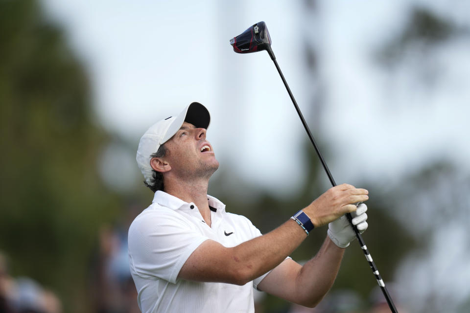 Rory McIlroy, of Northern Ireland, reacts after his tee shot on the 16th hole during the first round of the Players Championship golf tournament Thursday, March 9, 2023, in Ponte Vedra Beach, Fla. (AP Photo/Charlie Neibergall)