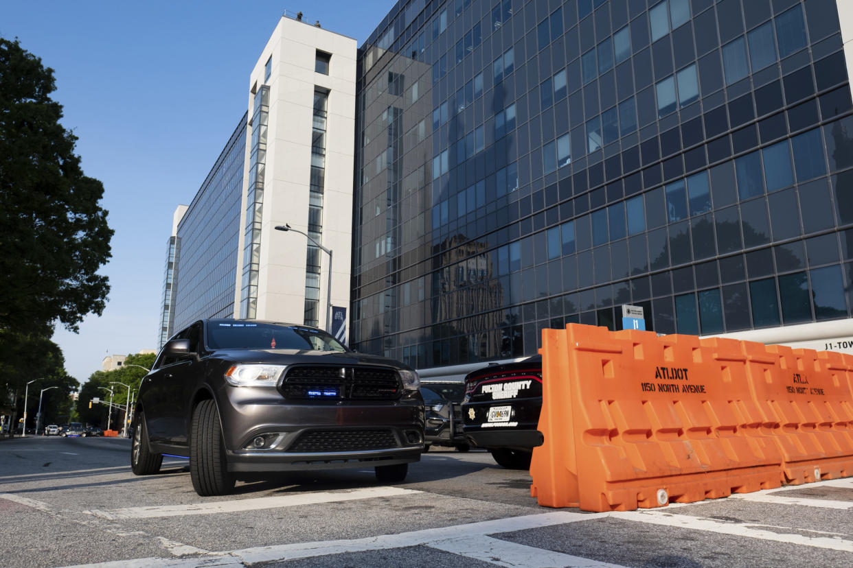 FILE - Roads around the Fulton County Courthouse in Atlanta are closed May 2, 2022, before the beginning of jury selection to seat a special purpose grand jury to look into possible meddling in the 2020 election in Georgia. (AP Photo/Ben Gray, File)