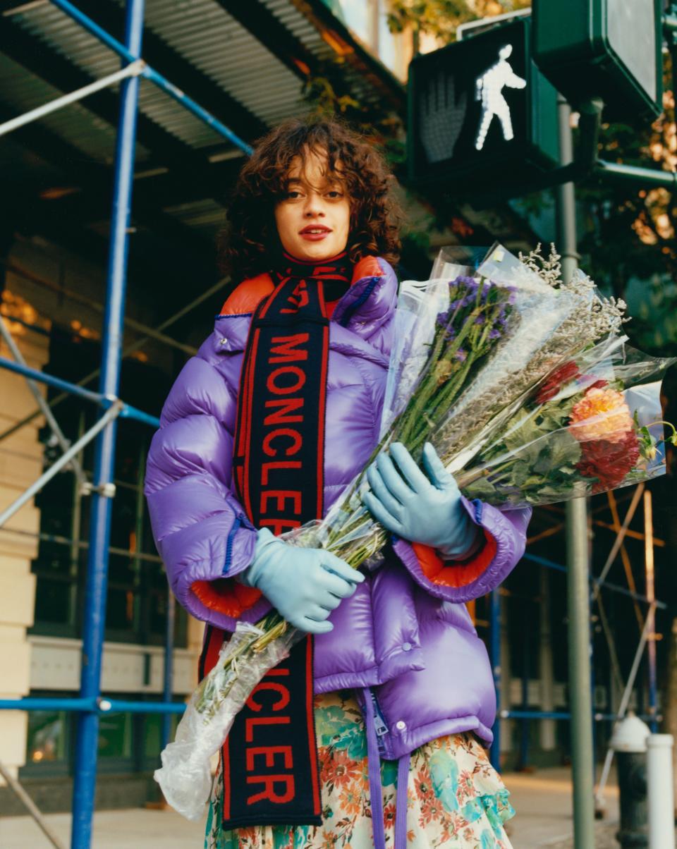 Tandi Reason Dahl stops by the flower market before a friend’s dinner party, keeping warm in a <a rel="nofollow noopener" href="https://weallwear.moncler.com/" target="_blank" data-ylk="slk:Moncler Callis puffer;elm:context_link;itc:0;sec:content-canvas" class="link ">Moncler Callis puffer</a>, $1,375.