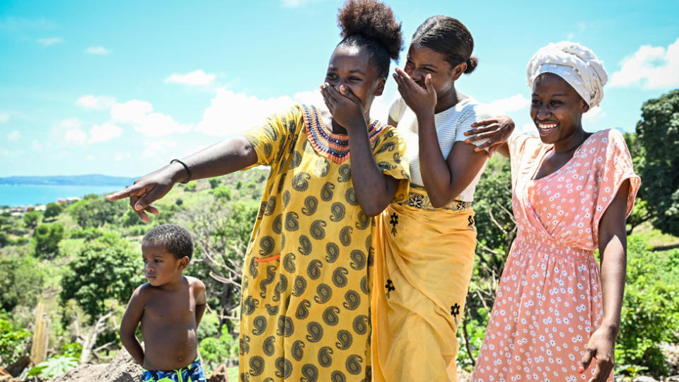 Laughing girls in the Mavadzani shantytown in Mayotte, France - Friday 8 December 2023