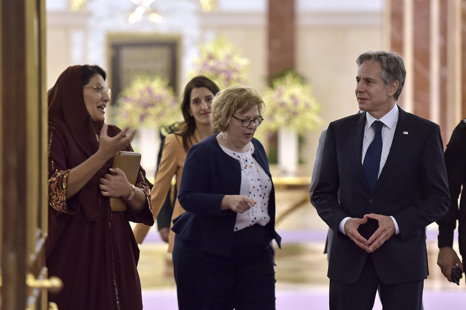 Saudi Ambassador to U.S. Reema Bint Bandar, left, chats with U.S. Secretary of State Antony Blinken, right, in Jeddah, Wednesday, June 7, 2023. Blinken arrived in Saudi Arabia, June 6, 2023, on a trip to strengthen strained ties with the long-time ally as the oil-rich kingdom forges closer (Amer HIilabi/Pool Photo via AP)