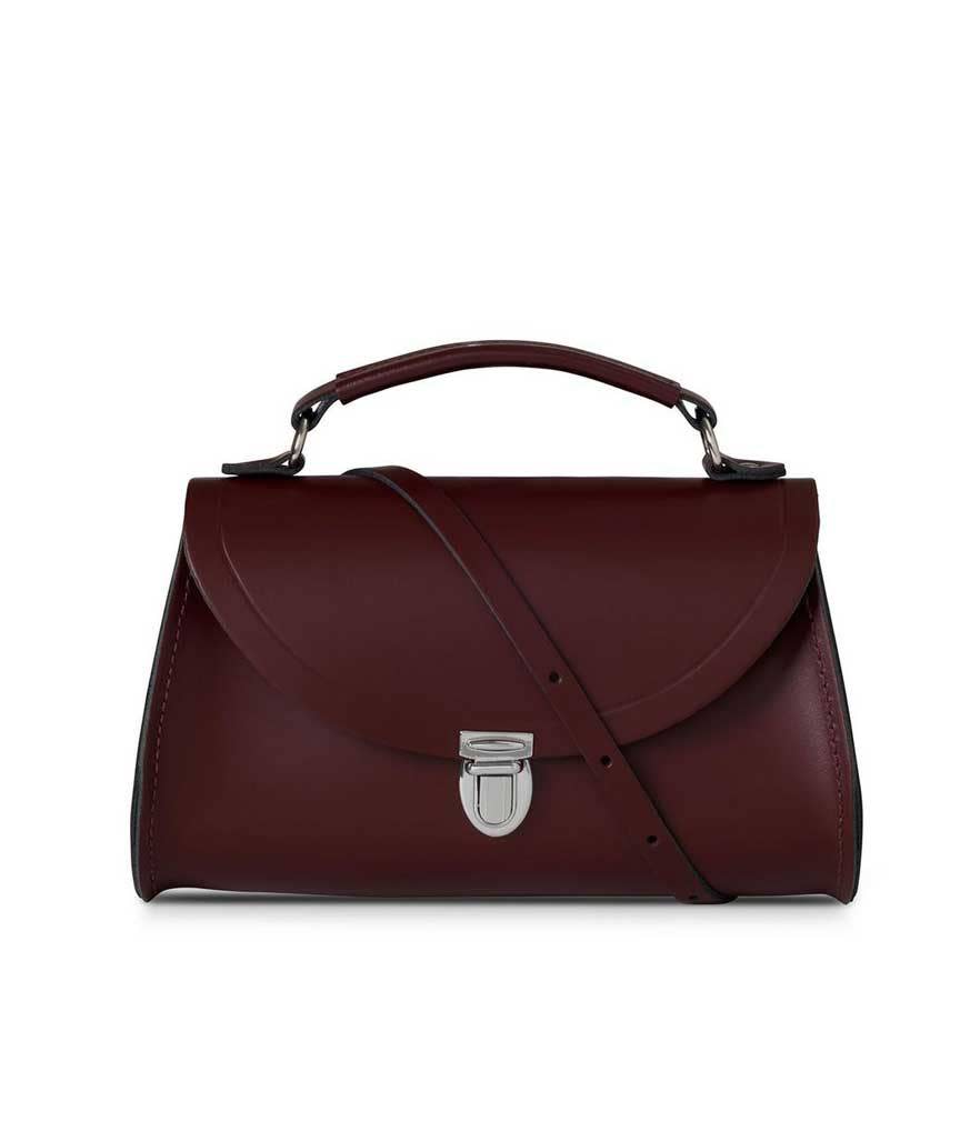 <p>Mini Poppy Bag, $145, <a href="http://www.cambridgesatchel.com/en-gb/womens-new-season/the-mini-poppy-bag/POPMI1005BNH10101.html?cgid=womens-new-season" rel="nofollow noopener" target="_blank" data-ylk="slk:cambridgesatchel.com;elm:context_link;itc:0;sec:content-canvas" class="link ">cambridgesatchel.com</a></p>