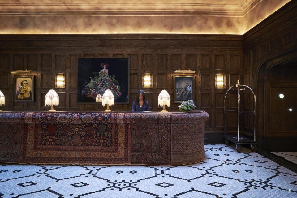 The Beekman's bohemian lobby with rug-draped counter and ever friendly staff