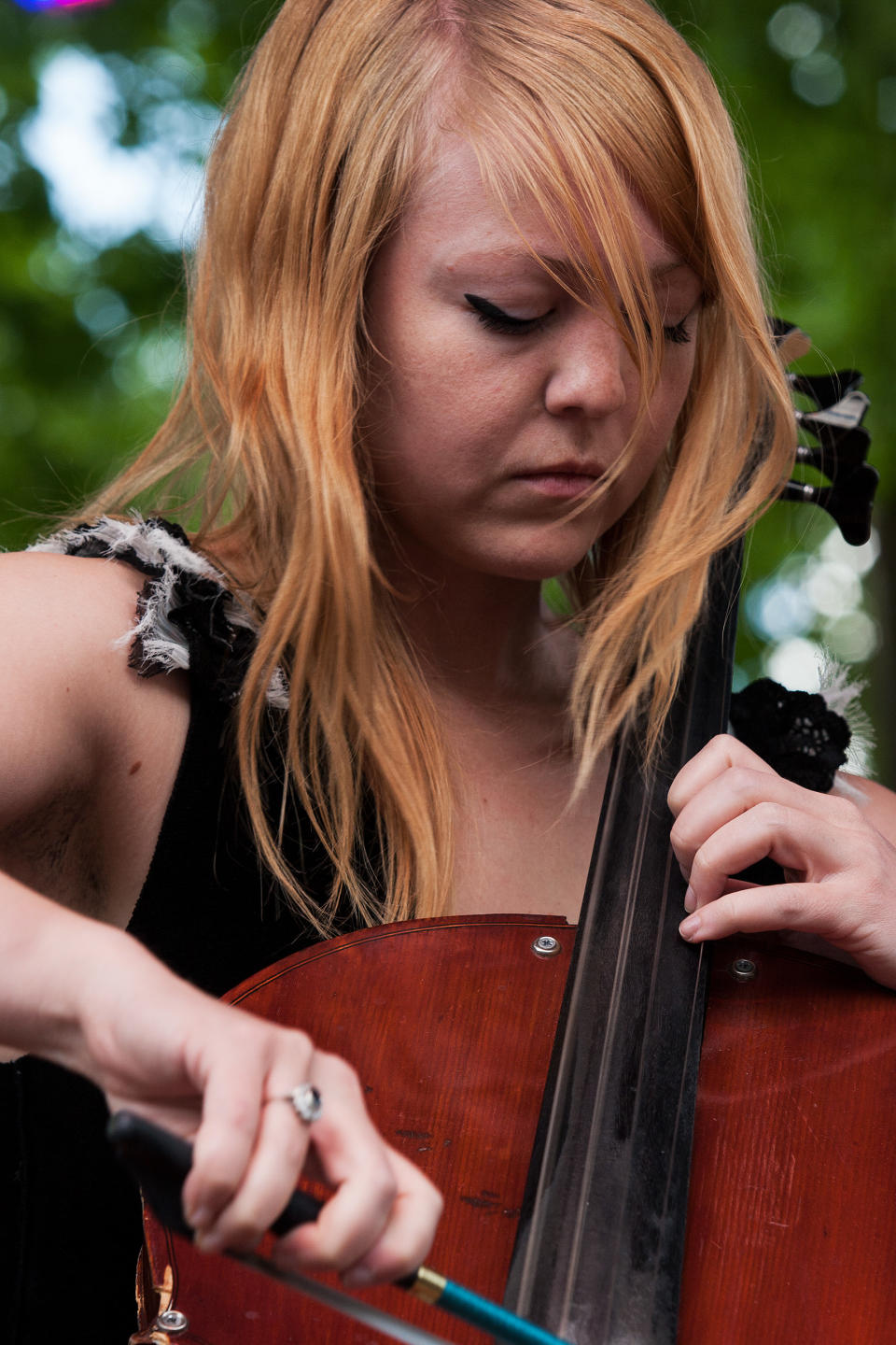 Sarah Balliet, cellist for the band Murder By Death, performs during the inaugural Shaky Knees Music Festival on Sunday, May 5, 2013, in Atlanta. (AP Photo/Ron Harris)