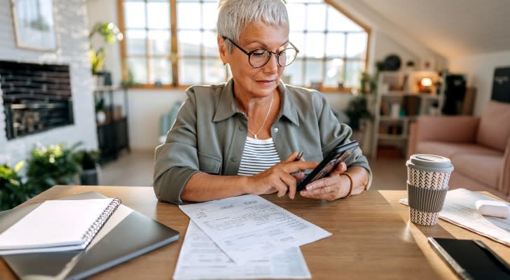 A senior creating a budget for her retirement expenses.