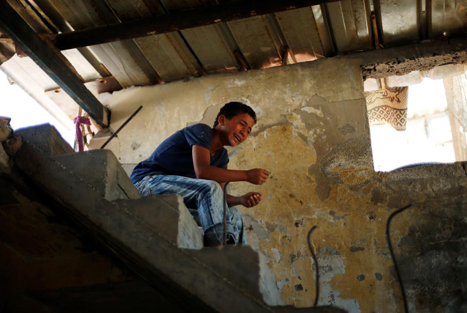 A boy cries during the funeral of Abdel-Rahman Al-Dabbagh, an 18-year-old Palestinian who was killed on Friday during a rock-throwing protest near the Gaza-Israel border, in central Gaza Strip