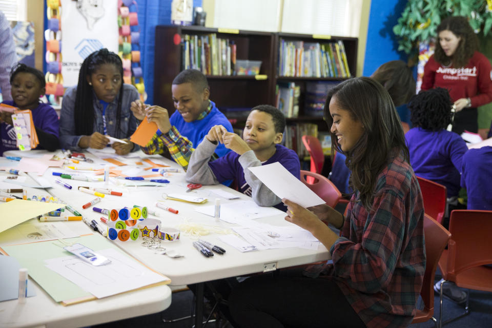 Malia Obama participates in a service project at the Boys & Girls Club of Greater Washington to celebrate Martin Luther King, Jr. Day of Service on Monday, Jan. 19, 2015, in Washington.