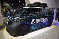 <p>Imported from Europe especially for SEMA, this custom ID Buzz Cargo van was created by Jamie Orr and Auto Östringer in Germany. In addition to the wrap featuring sponsor Landsail Tires, it has 21-inch Rotiform wheels, H&R coilovers and a Thule Caprock roof platform rack for spare tires.</p>