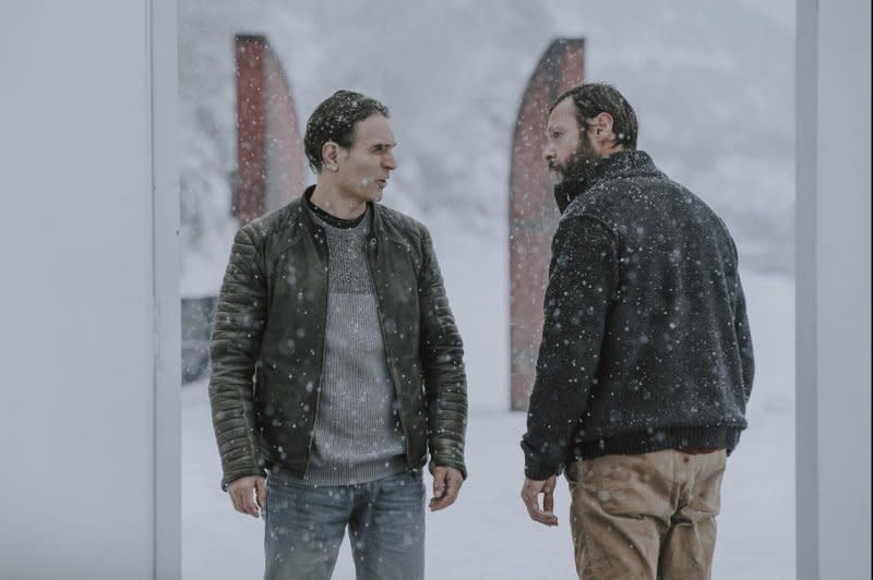 Neither Daniel (Arben Bajraktaraj, L) nor Nathan (Hugo Dillon) want to go through the red door. Photo courtesy of Arrow Films