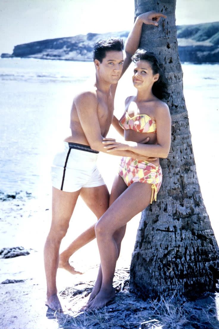 <p>When you have a heartthrob like Elvis on screen in some tiny trunks you need a woman who can hold her own. Thankfully, Blackman rocked this strapless high-waisted bikini. </p>