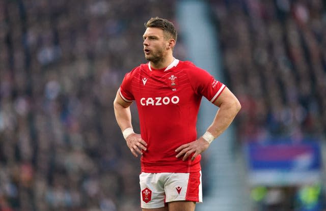 Dan Biggar stands with his hands on his hips