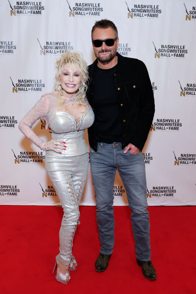 (L-R) Dolly Parton and Eric Church at the 2023 Nashville Songwriters Hall Of Fame Gala on Oct. 11 in Nashville, Tennessee.