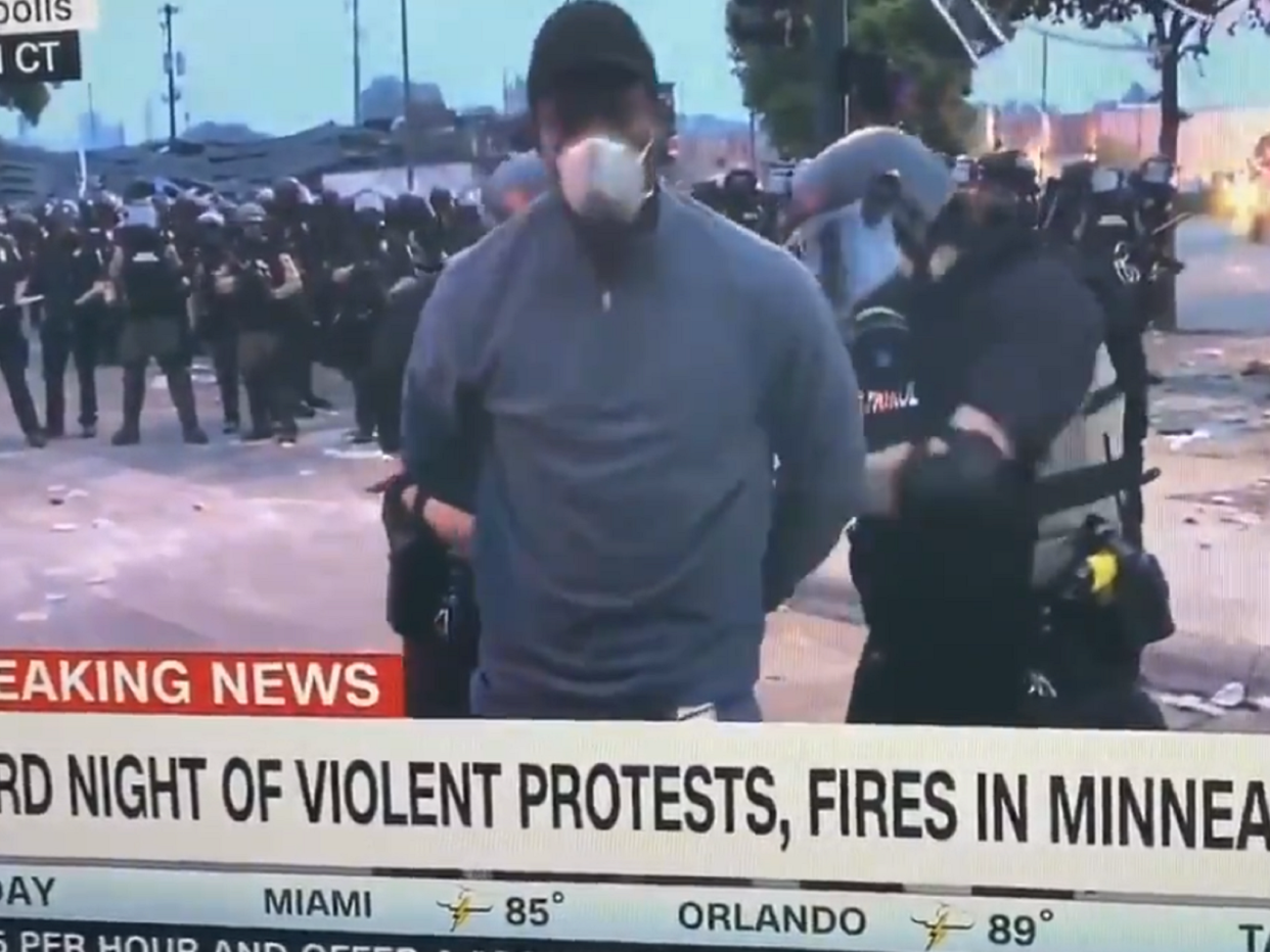 CNN reporter Omar Jimenez and other members of his television crew were arrested by police live on air while covering the Minneapolis protests over the death of black man George Floyd, 29 May 2020: CNN