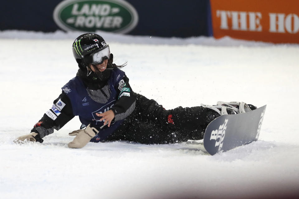 Kokomo Murase, of Japan, falls after crashing on the final jump during the finals of the Big Atlanta snowboard competition Friday, Dec. 20, 2019, in Atlanta. (AP Photo/John Bazemore)