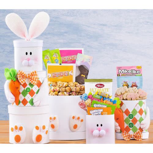 white teen easter basket tower in shape of rabbit with candy and snacks inside